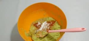 Add chili powder, salt, and half a spoonful of dry coriander