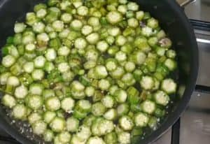 Add the okra rings and let it simmer for 15 minutes