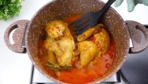 After 30 minutes, remove the chicken from the pot and set it aside