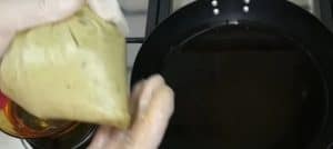 Open the bag on one side and take a few falafel