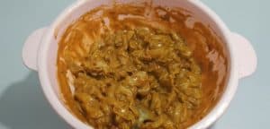 Put the marinade on the chicken breasts, stir well, then add a little salt