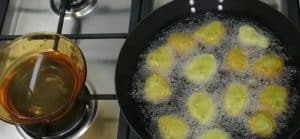 Put the oil in a frying pan and make it very hot, then put the falafel balls in the oil (use a small bowl of water) to make the balls easier to make.