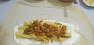 Put the shawarma on the fried potatoes