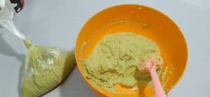 To make falafel balls, take a portion of the falafel and put it in a food bag (as shown in the picture).