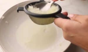 Grate a large onion and drain it using a food strainer